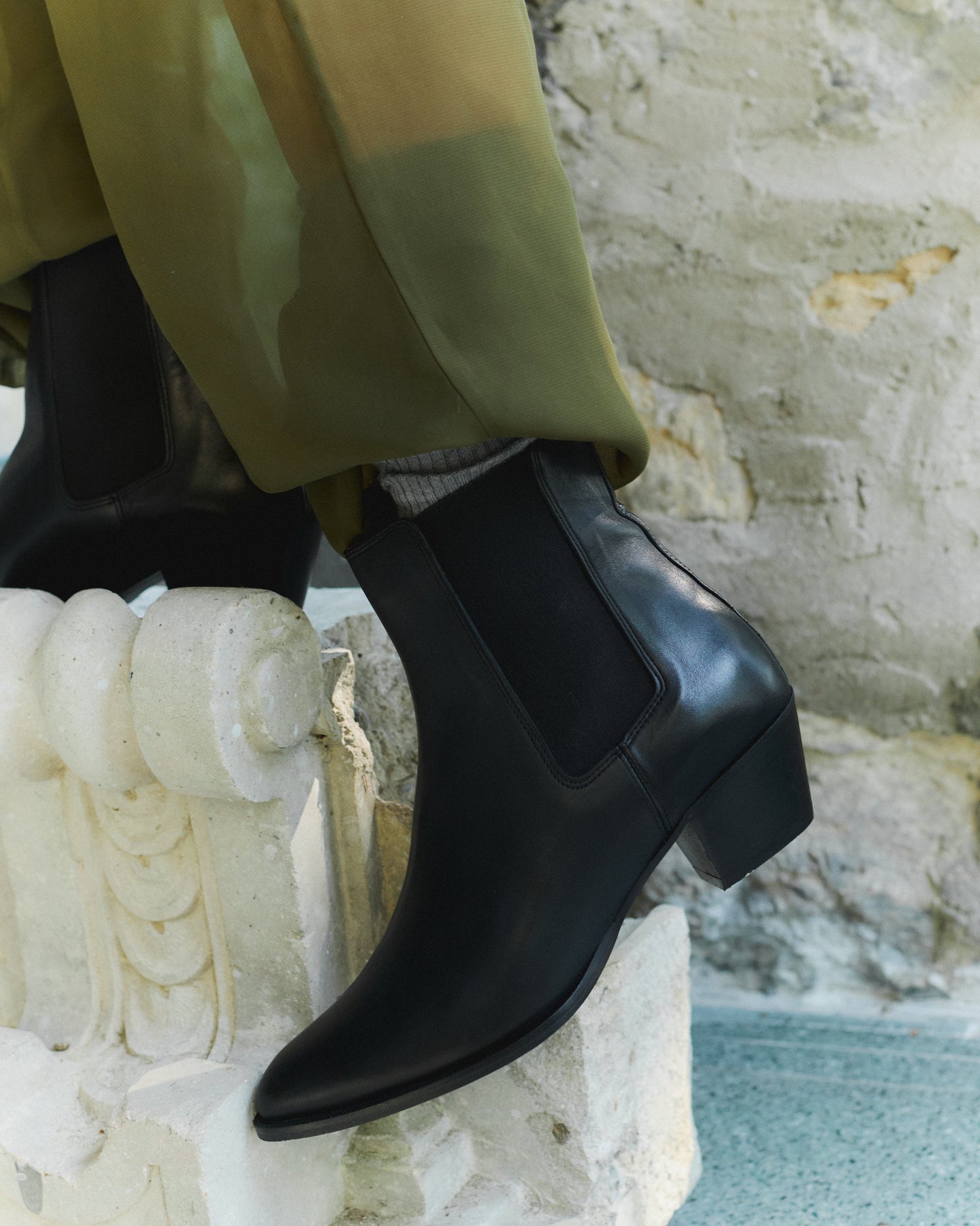 Faith ankle boot in smooth black leather with elastic side panels and low block heel