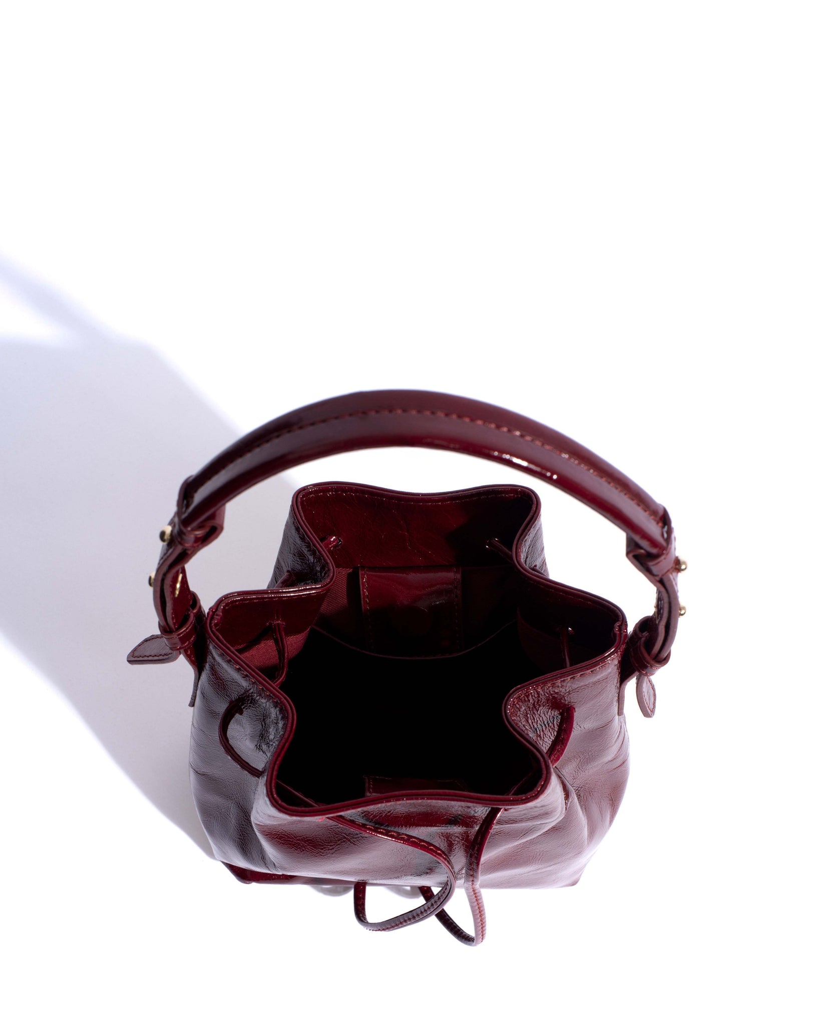 Kacey petite bucket bag Crinkled polished goat Pomegranate