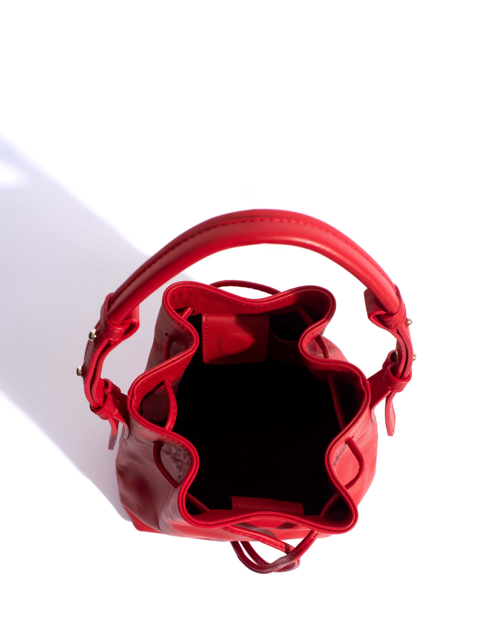 Kacey petite bucket bag Soft calf Ruby red