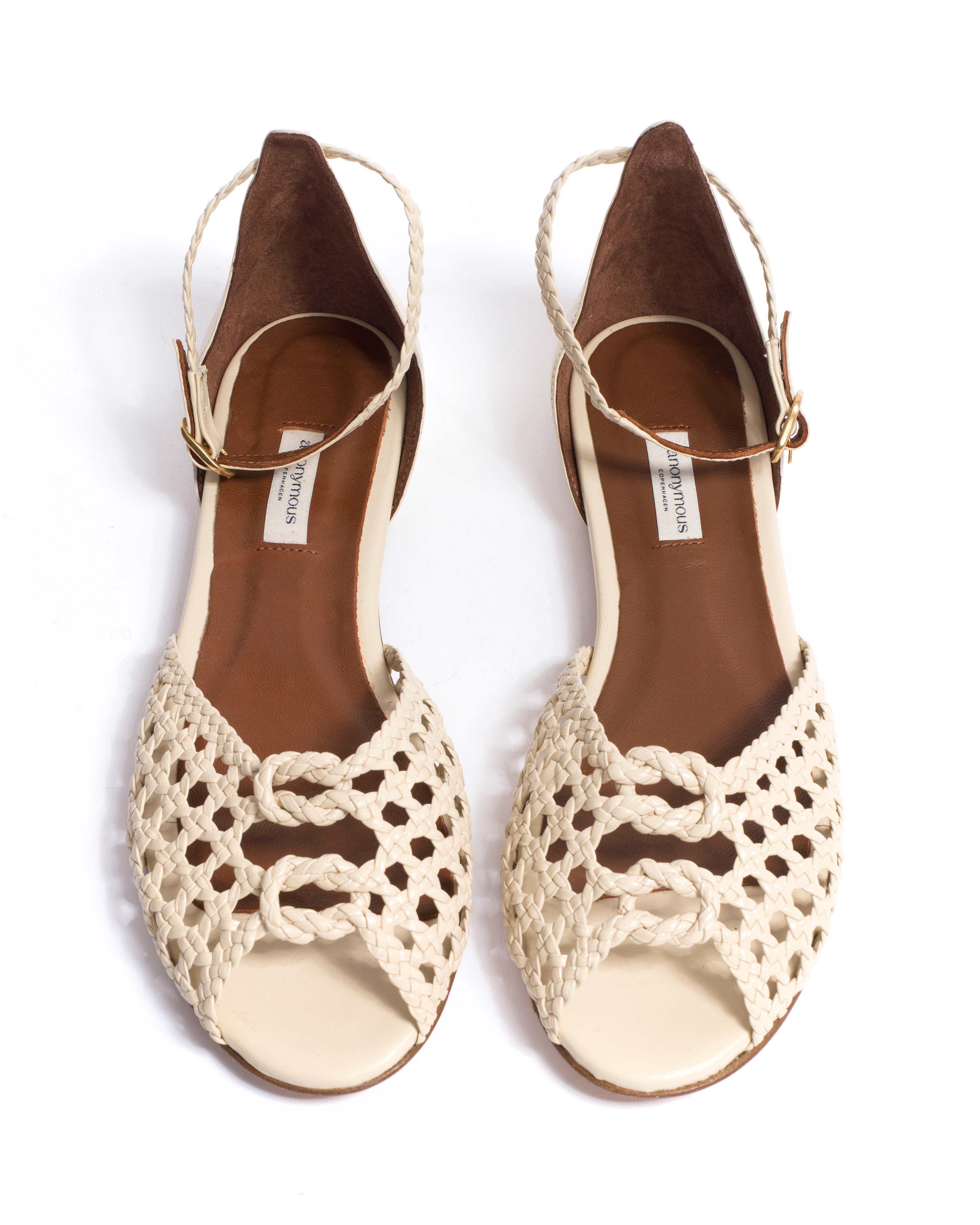 Lucy 10 Hand-braided leather White sand