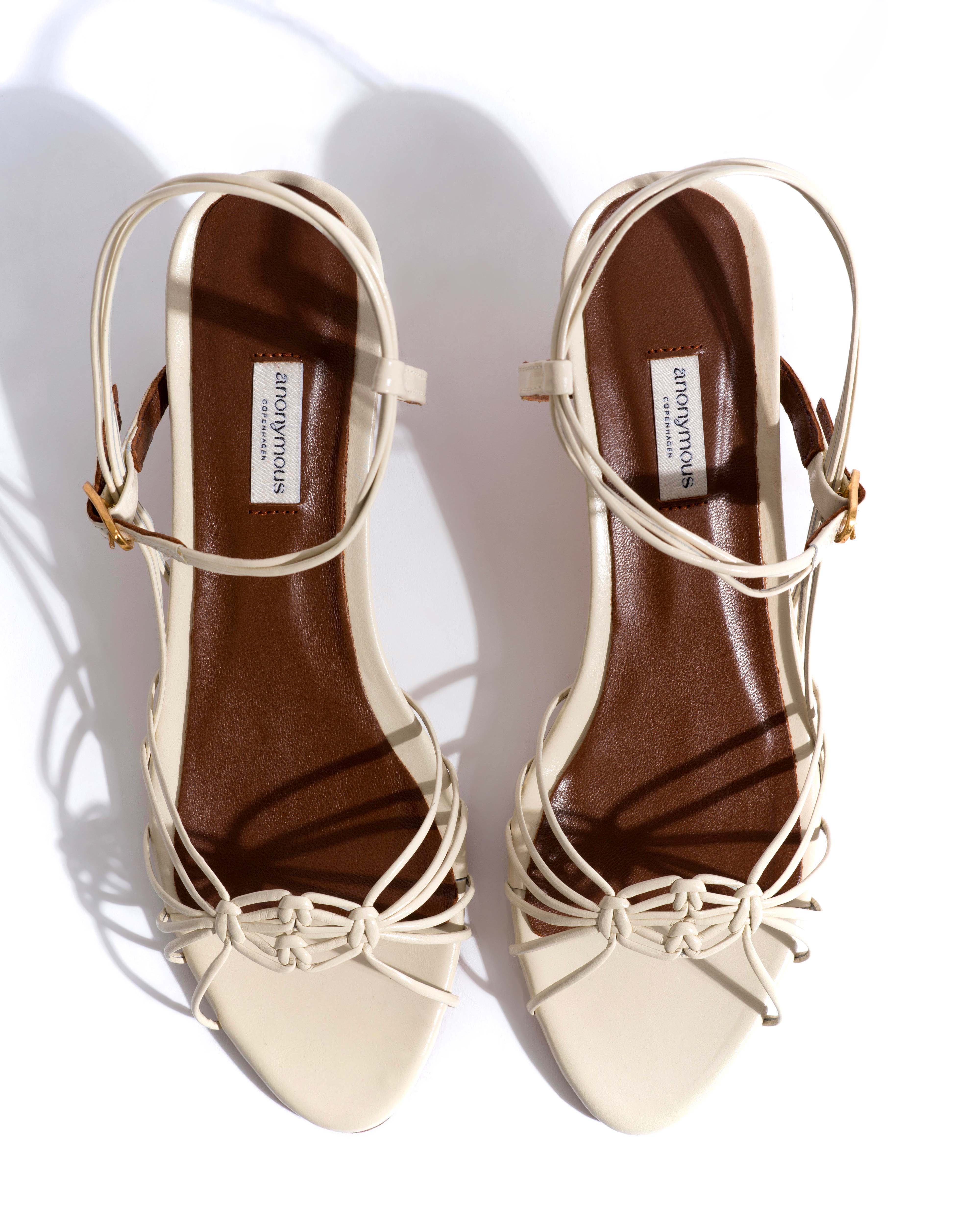 Savannah 40 hand-braided Crinkled polished goat White sand