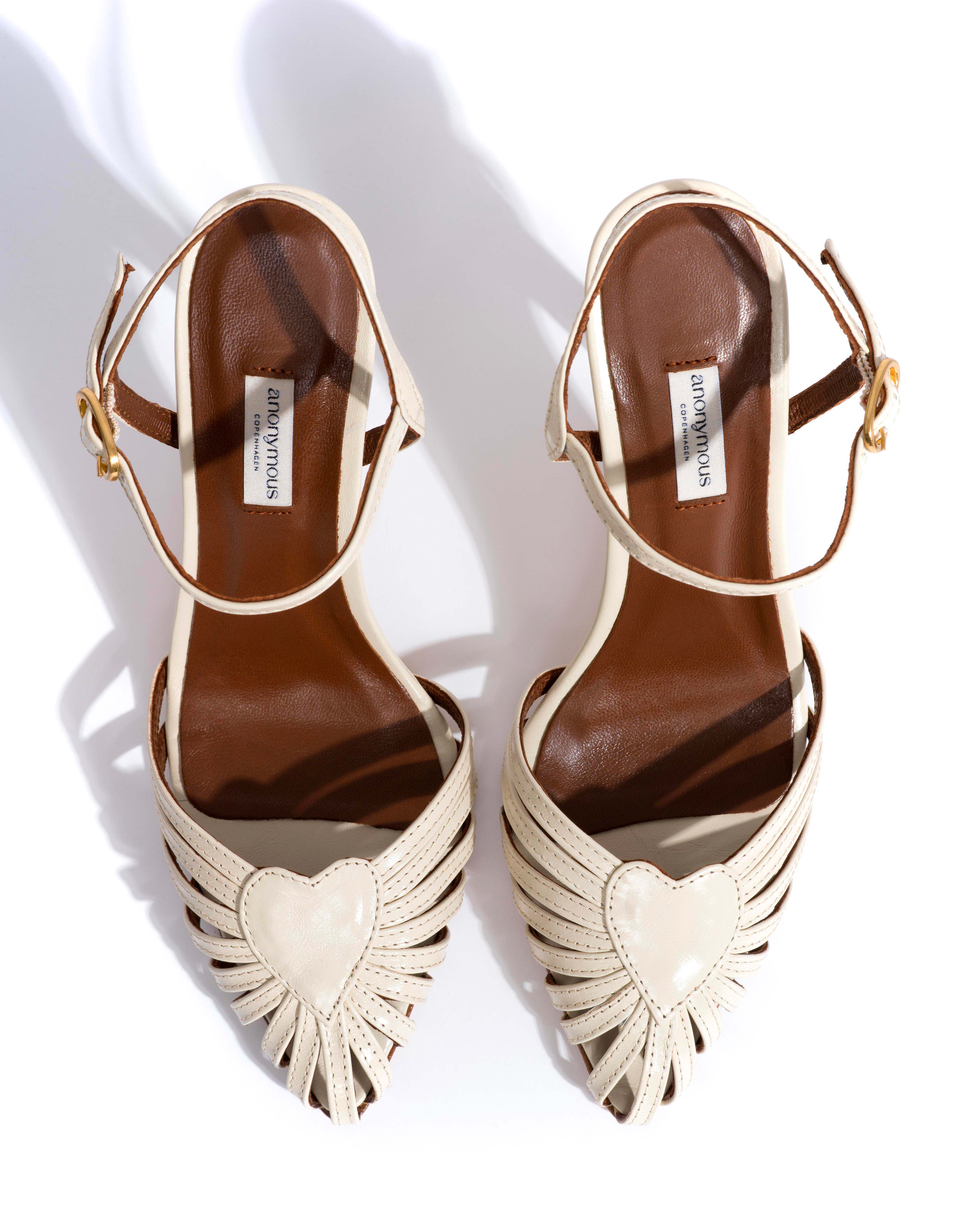 Keesha 100 Crinkled polished goat White sand